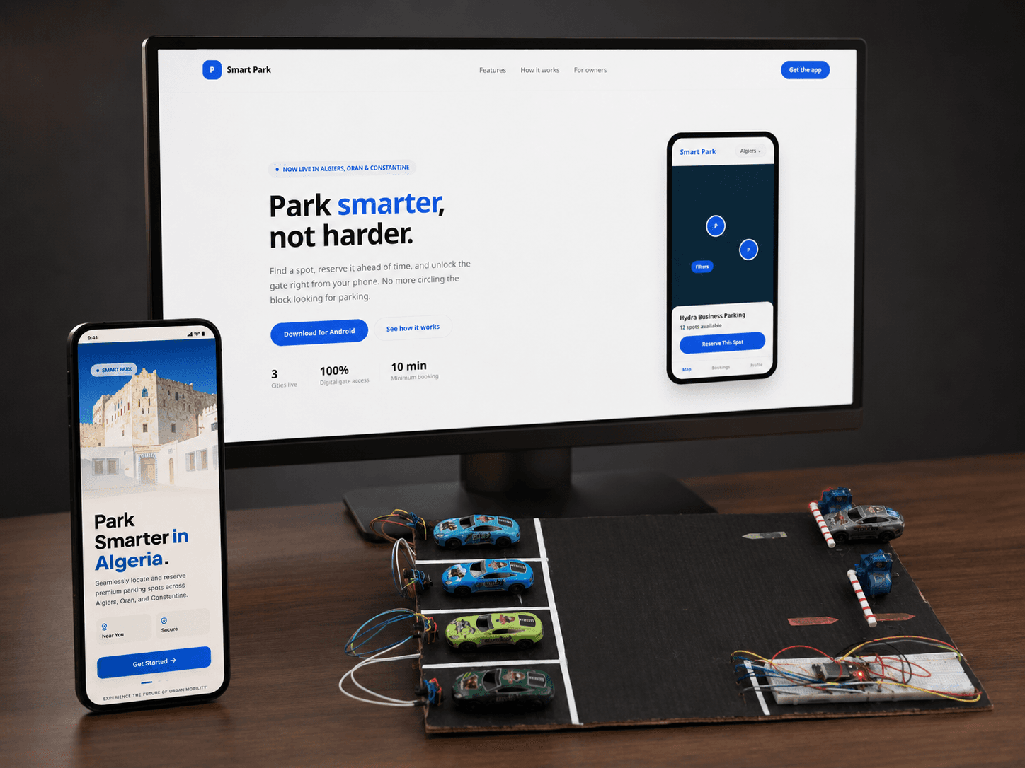 SmartPark running on a monitor, a phone, and an ESP32 prototype board